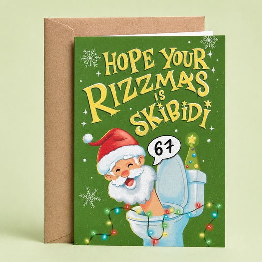 Sleazy Greetings funny Christmas card featuring the phrase ‘Hope Your Rizzmas Is Skibidi’ with a humorous Santa character popping out of a toilet surrounded by colorful Christmas lights and a speech bubble reading ‘67.’ Silly meme-inspired holiday greeting card with snowflake accents and a kraft envelope included.