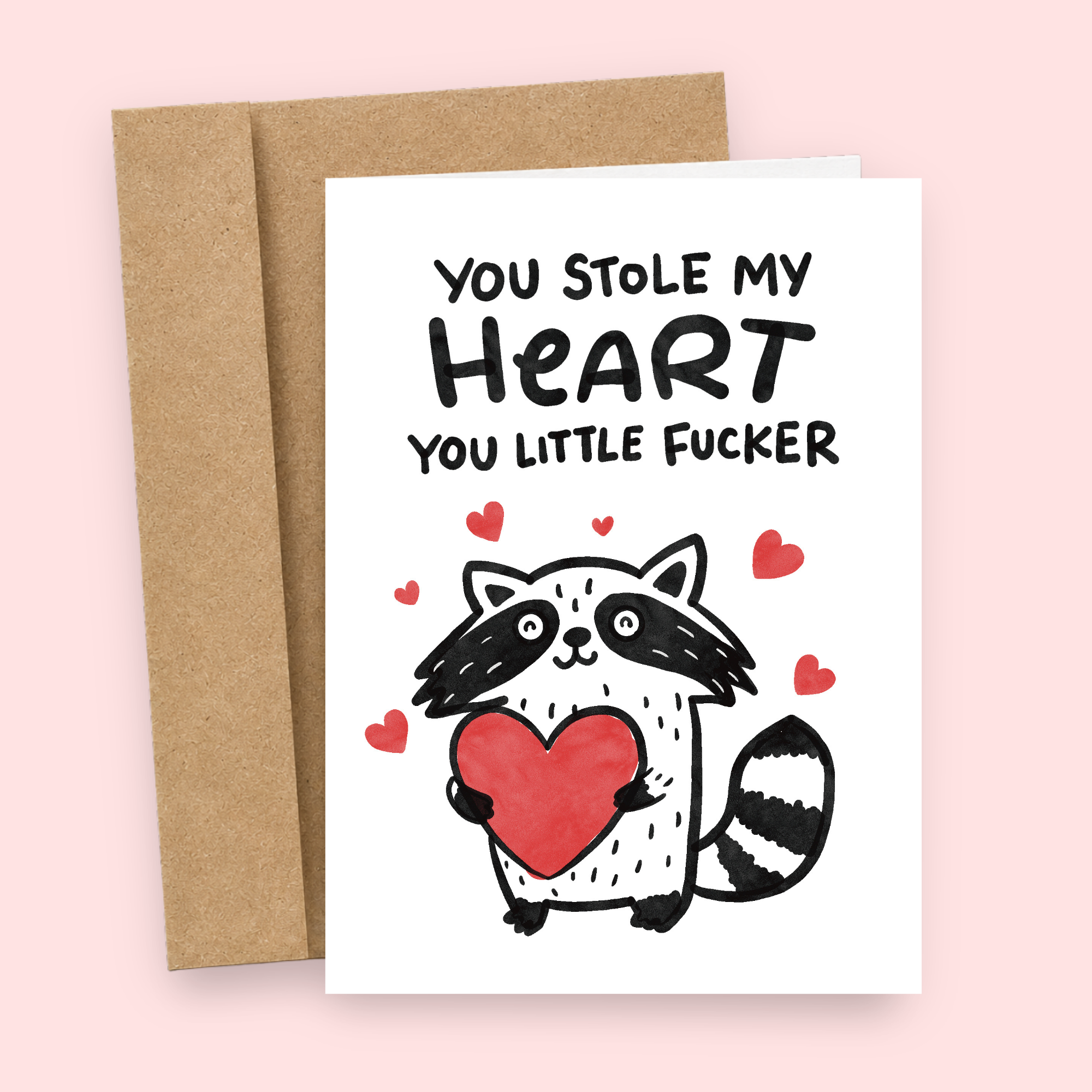 Sleazy Greetings funny romantic greeting card featuring a cute black and white raccoon holding a red heart, surrounded by little red hearts, with the phrase “You Stole My Heart You Little Fucker.” Cheeky love card for couples, anniversaries, Valentine's Day, or anyone who enjoys rude humor.
