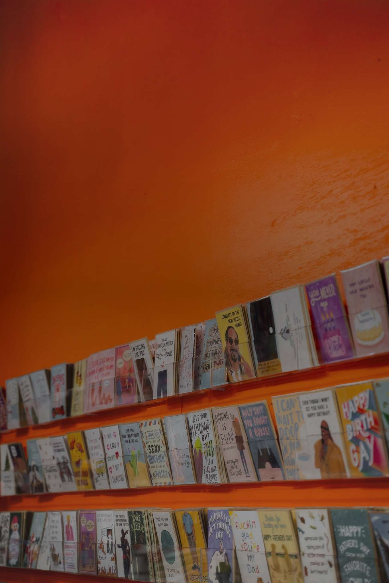 Sleazy Greetings, spinning greeting card rack. Sleazy greetings makes some of the best snarky, adult, and hilarious greeting cards online.