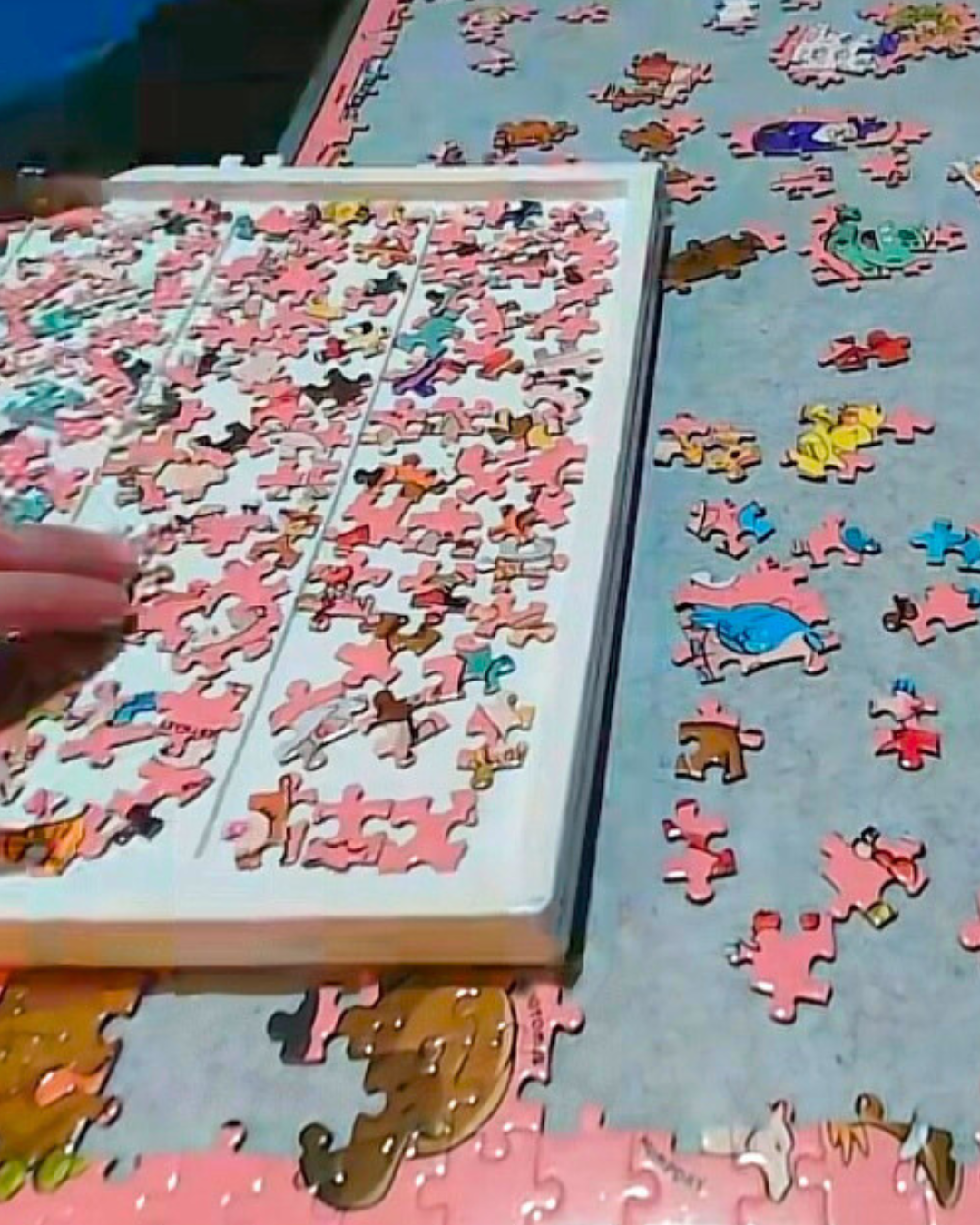 People laughing while assembling the naughty Tits a Puzzle adult puzzle, a funny inappropriate gift idea.