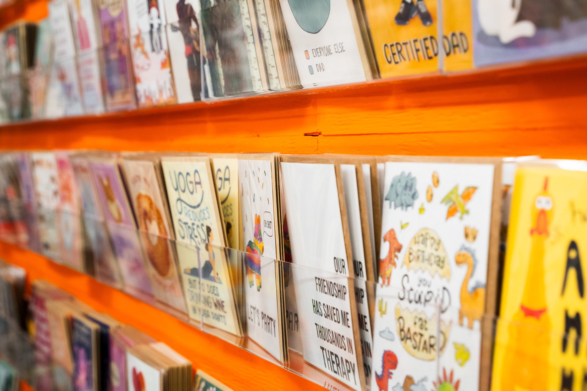 Funny inappropriate greeting cards on display – Sleazy Greetings wall